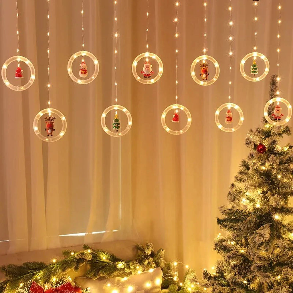 Cortina de Luzes LED com Figuras Natalinas – Argolas, Árvores, Corações e Estrelas